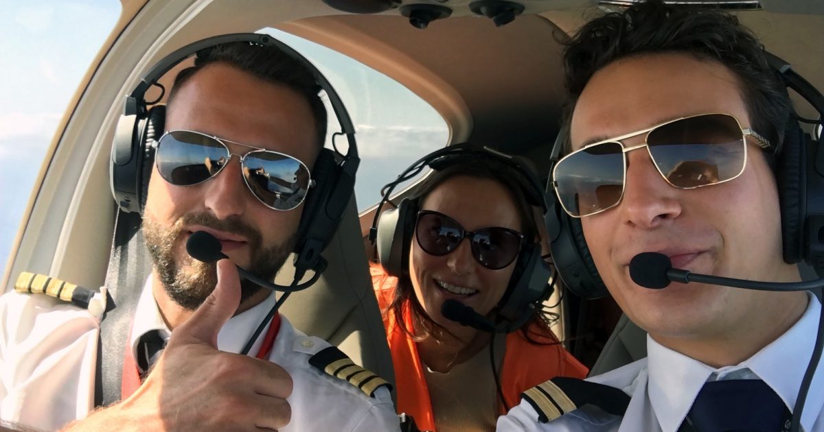 Aviation Medicals - two pilots and a passenger on a small airplane.
